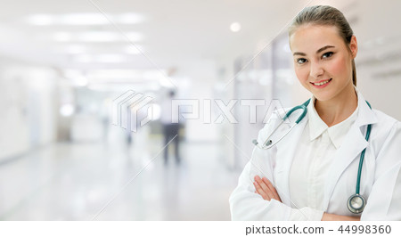 Woman doctor working at the hospital office. Woman doctor working at the hospital office. 44998360