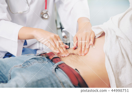 Woman Doctor and Male Patient in Hospital Office 44998751