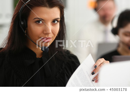 Three call centre service operators at work 45003178