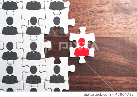 Images of personnel and employment. Choose the right person for your organization. Make a jigsaw puzzle at the wood desk. 45004782