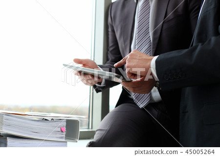 Two businessman are looking and 45005264