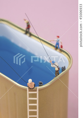 Miniature people fishing on cans Miniature people fishing on cans 45006933