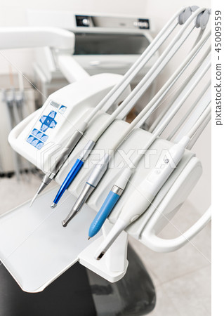 Stomatological instrument in the dentists clinic. Dental work in clinic. Operation, tooth 45009559