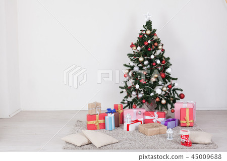 Christmas tree with presents, Garland lights new year Christmas tree with presents, Garland lights new year 45009688