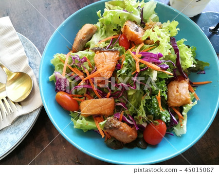 Fried salmon salad in blue dish, vintage 45015087