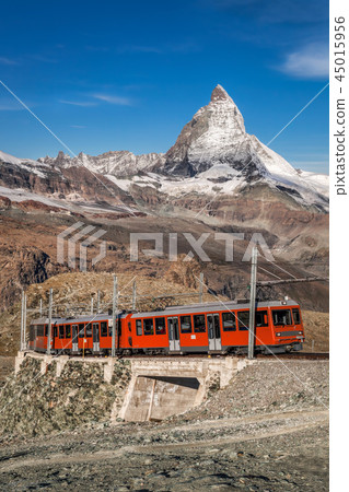 Matterhorn peak and Gornergrat train in Swiss Alps 45015956