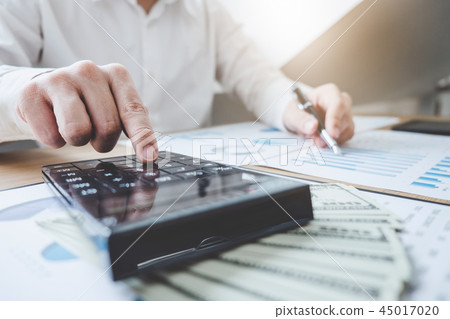 Finances Saving Banking Concept, Man accountant calculations inc 45017020