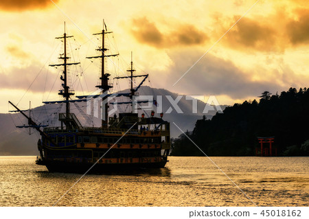 Silhouette Pirate ship an torii gate at lake Ashi Silhouette Pirate ship an torii gate at lake Ashi 45018162