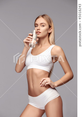 Perfect slim toned young body of the girl . Perfect slim toned young body of the girl . 45018243