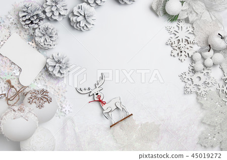 Christmas decorative composition of toys on a white background surrealism. Top view 45019272