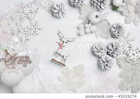 Christmas decorative composition of toys on a white background surrealism. Top view 45019274