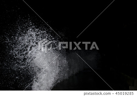 Splashing wave on the Black sea in the night. 45019285