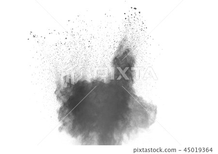 Black powder dust explosion on white background. 45019364
