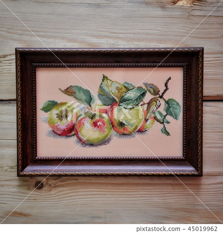 Handwork. Still life of red apples on a branch 45019962