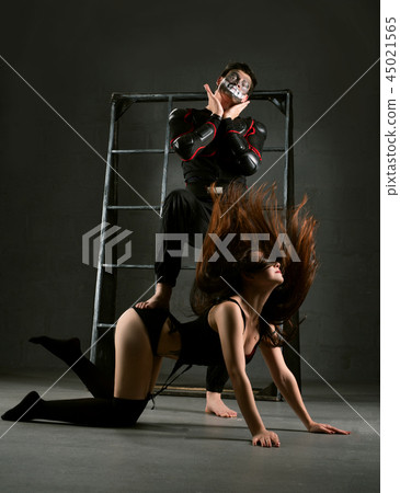 Sexy couple acting erotic bdsm perfomance 45021565