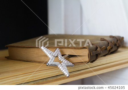 book with magic wand 45024105