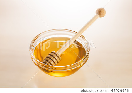 Honey and honey dipper Honey and honey dipper 45029956