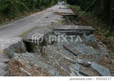 Road collapse due to heavy rain 45030117
