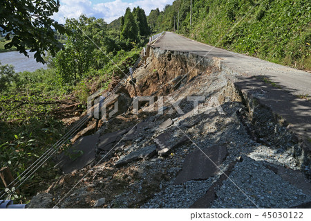 Road collapse due to heavy rain 45030122