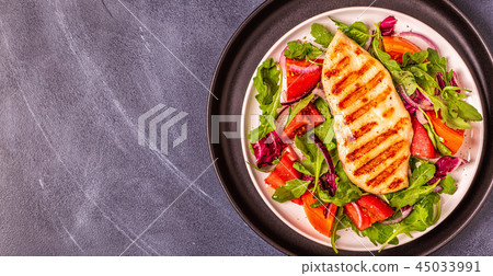 Chicken breast with fresh salad. Chicken breast with fresh salad. 45033991