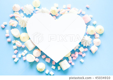 various pastel marshmallows on a blue background 45034910