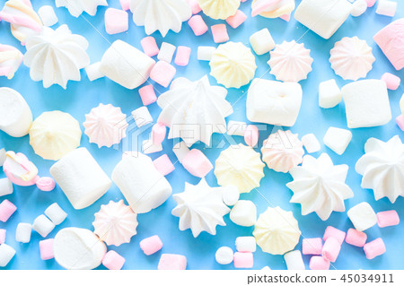 various pastel marshmallows on a blue background 45034911