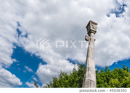 Wooden lantern sculpture and cloudy sky 45036391