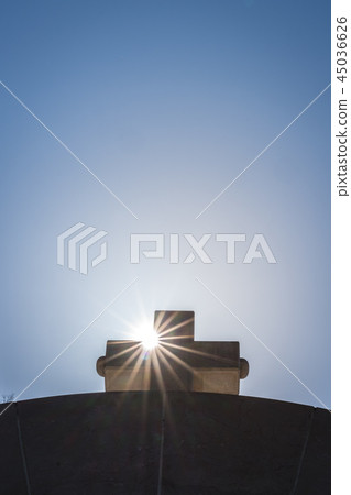 Cross on top of arched gates Cross on top of arched gates 45036626