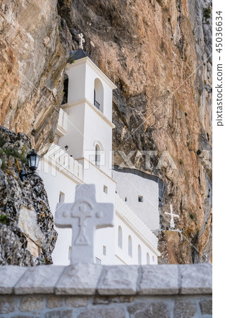 white cross and Ostrog Orthodox monastery white cross and Ostrog Orthodox monastery 45036634