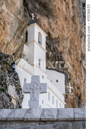 white cross and Ostrog Orthodox monastery white cross and Ostrog Orthodox monastery 45036635