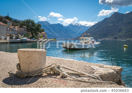 Concrete bollard with attached ropes Concrete bollard with attached ropes 45036683