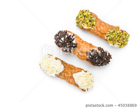 Three cannoli pastries 45038869