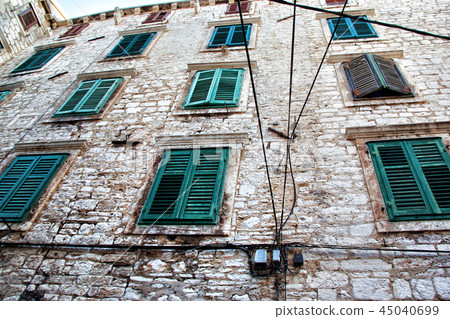 Wires against a deep blue sky. 45040699