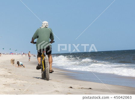Fat wheel bike on beach along the shore 45042063