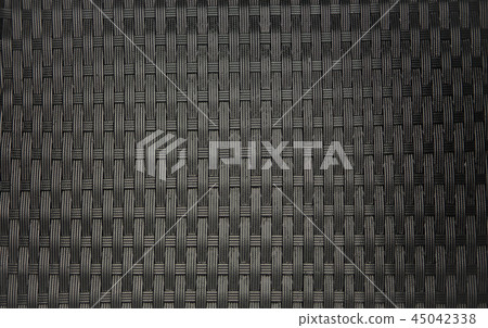 Dark brown rattan wicker texture or background. Dark brown rattan wicker texture or background. 45042338