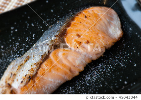 Salmon grilled with salt in Japanese style . 45043044