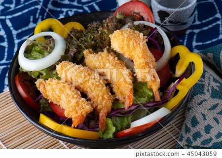 Salad with deep fried shrimps. Salad with deep fried shrimps. 45043059