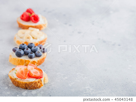 Fresh healthy mini sandwiches with cream cheese Fresh healthy mini sandwiches with cream cheese 45043148