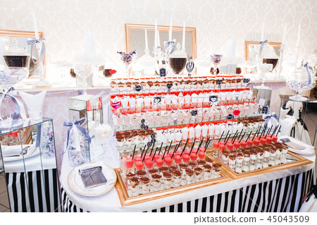 Different kinds of baked sweets on a buffet 45043509