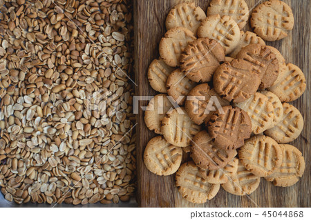 Freshly baked peanut butter cookies on cooling rack. Macro with extremely shallow dof Freshly baked peanut butter cookies on cooling rack. Macro with extremely shallow dof 45044868