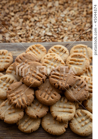 Freshly baked peanut butter cookies on cooling rack. Macro with extremely shallow dof Freshly baked peanut butter cookies on cooling rack. Macro with extremely shallow dof 45044874