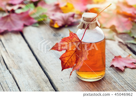 Maple syrup or healthy tincture and maple leaves. Maple syrup or healthy tincture and maple leaves. 45046962