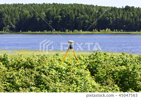 Geodetic GNSS receiver installed on the river bank works autonomously 45047563