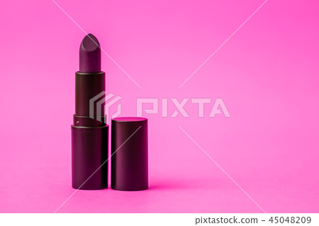 Dark Purple Matt Lipstick in on Pink Background 45048209
