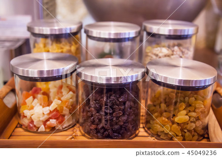 sweet glass mugs, jars or bottles on display sweet glass mugs, jars or bottles on display 45049236