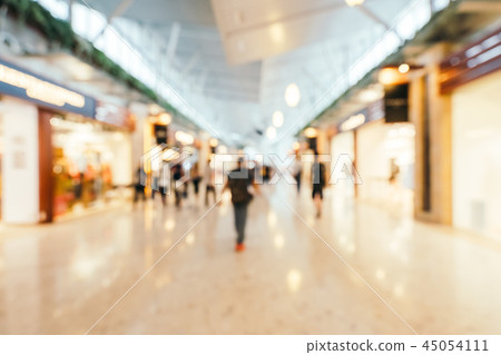 Abstract blur and defocused shopping mall of department store interior Abstract blur and defocused shopping mall of department store interior 45054111