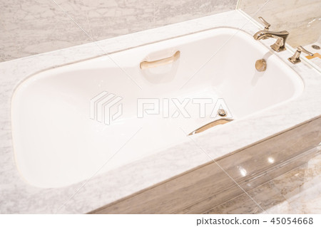 Beautiful luxury white bathtub and faucet 45054668