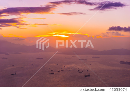 Beautiful colorful sunset in hong kong city skyline Beautiful colorful sunset in hong kong city skyline 45055074