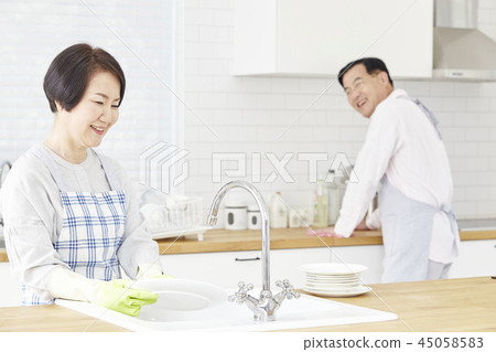 Washing dishes, kitchen, couple 45058583