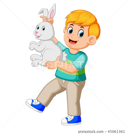happy boy holding a rabbit happy boy holding a rabbit 45061361